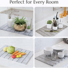 Stone dish mat slate gray dish mats used in various settings including a kitchen and bathroom.